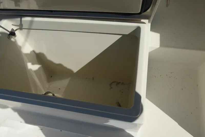 Slide: The Image of Open storage compartment on a 2006 Hydra-Sports Vector 2900 VX boat. - 40