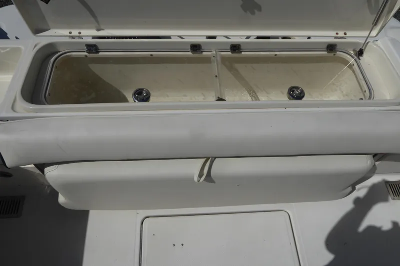 Slide: The Image of 2006 Hydra-Sports Vector 2900 VX boat storage compartment open, showing interior details. - 43