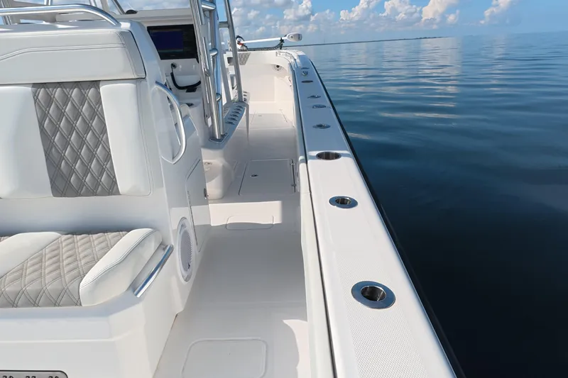 Slide: The Image of 2023 Invincible 33 Catamaran interior with luxurious seating and ocean view. - 29