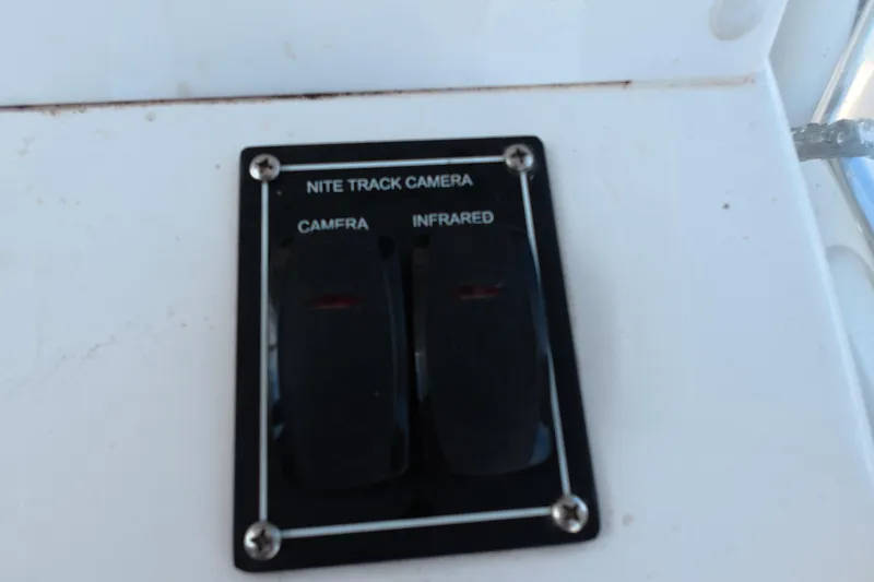 Slide: The Image of Nite Track Camera controls on 2023 Invincible 33 Catamaran dashboard. - 35