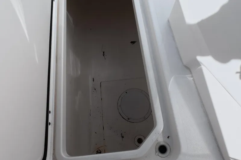 Slide: The Image of Storage compartment of 2023 Invincible 33 Catamaran, featuring a clean, spacious interior. - 37