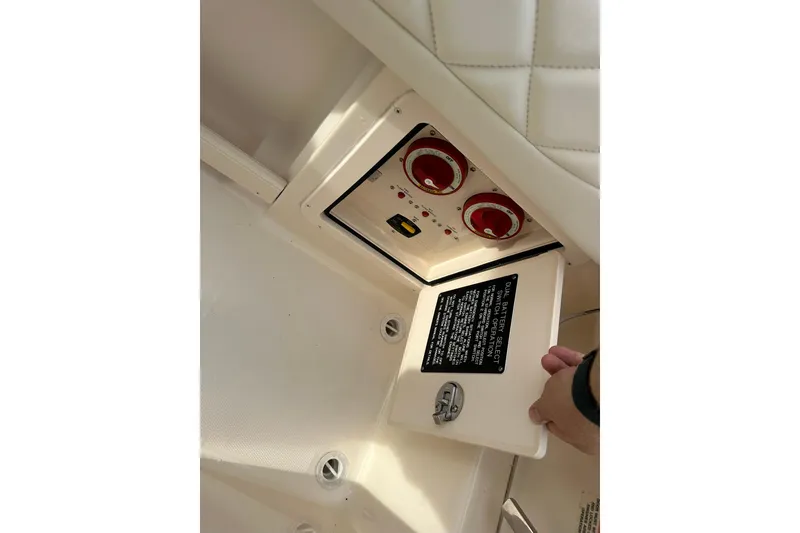 Slide: The Image of Control panel of 2011 Grady-White Freedom 275 boat with dual battery switches. - 15