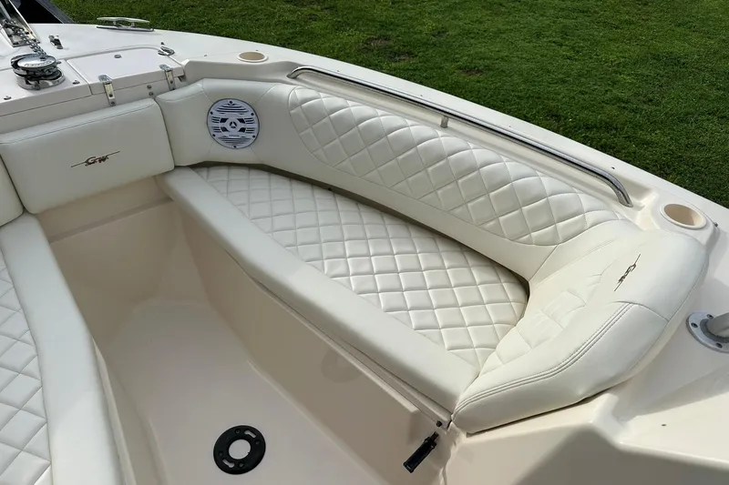 Slide: The Image of 2011 Grady-White Freedom 275 boat with luxurious white quilted seating. - 23