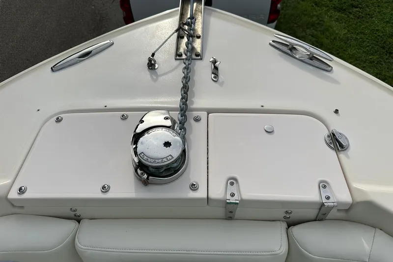 Slide: The Image of Bow of 2011 Grady-White Freedom 275 boat with anchor chain and winch. - 24