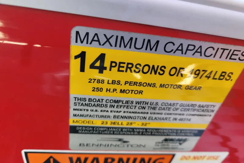 Slide: The Image of 2014 Bennington G23 capacity label, 14 persons, 1974 lbs, 250 HP motor. - 15