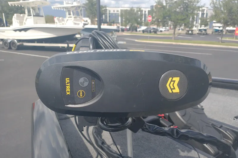 Slide: The Image of Trolling motor on 2023 Tracker Pro Team 190 TX boat in parking lot. - 5