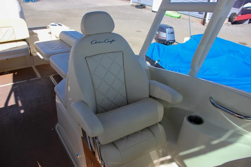 Slide: The Image of Luxurious seating on 2017 Chris-Craft Calypso 26 boat, featuring elegant design and comfort. - 24