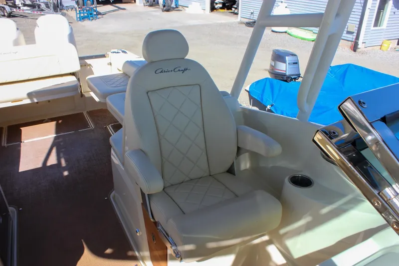 Slide: The Image of Luxurious seating on 2017 Chris-Craft Calypso 26 boat, featuring elegant design and comfort. - 25