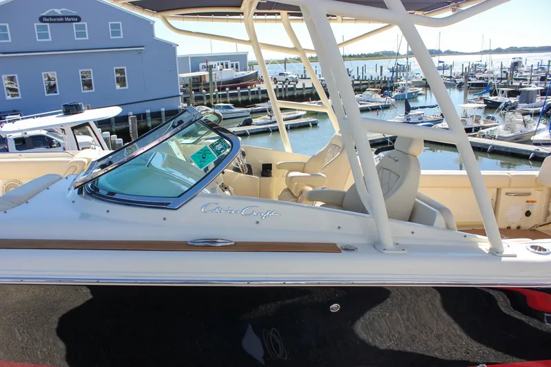 Slide: The Image of 2017 Chris-Craft Calypso 26 boat docked at Harborside Marina. - 57