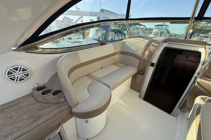 Slide: The Image of 2016 Formula 37 Performance Cruiser interior with beige seating and modern design. - 11