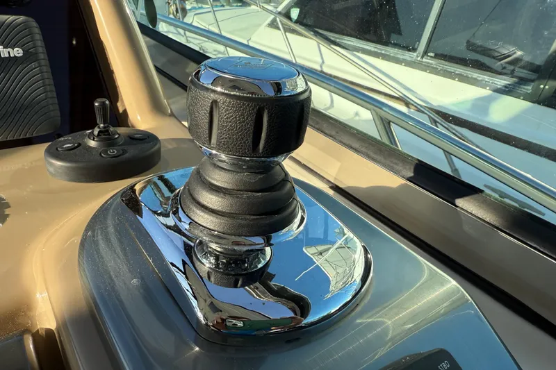Slide: The Image of Joystick control on 2016 Formula 37 Performance Cruiser boat dashboard. - 16