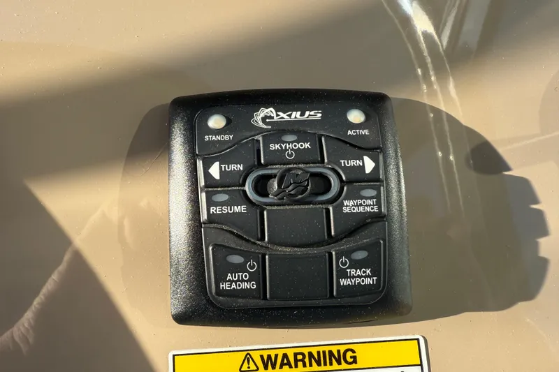 Slide: The Image of Axius control panel on 2016 Formula 37 Performance Cruiser, featuring navigation and steering functions. - 17