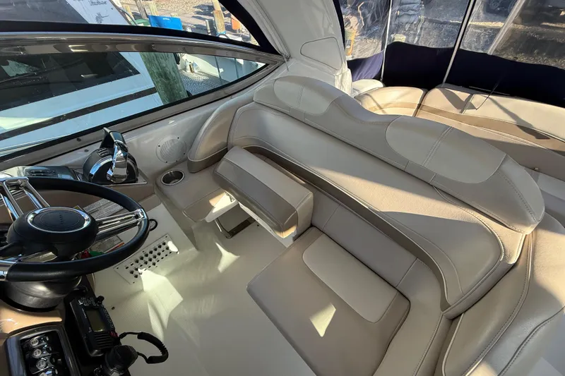 Slide: The Image of Interior of 2016 Formula 37 Performance Cruiser with beige seating and steering wheel. - 8