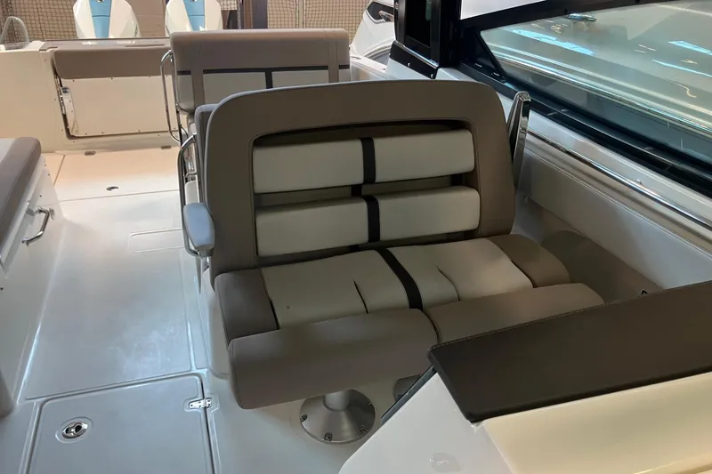 Slide: The Image of 2026 Boston Whaler 330 Vantage interior seating, featuring modern design and comfortable upholstery. - 21