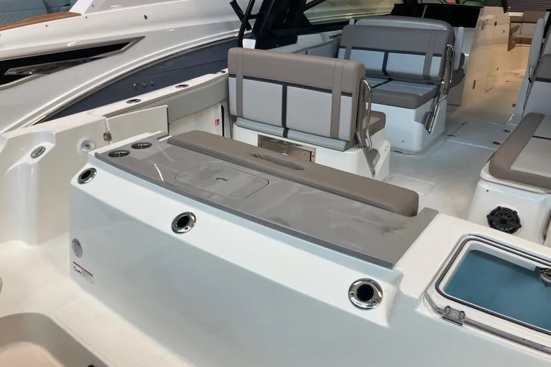 Slide: The Image of 2026 Boston Whaler 330 Vantage interior with seating and storage features. - 5