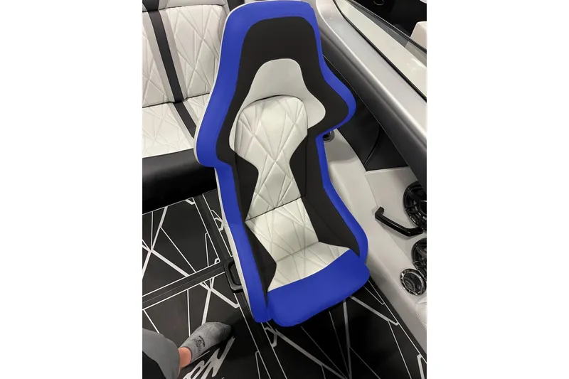 Slide: The Image of 2026 Nor-Tech 4000 Roadster boat interior under construction in a workshop. - 12