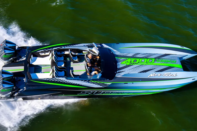 Slide: The Image of 2026 Nor-Tech 4000 Roadster interior with blue and white racing seat design. - 3