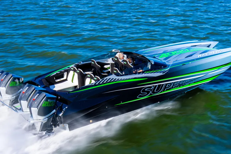 Slide: The Image of Nor-Tech 4000 Roadster 2026 speeding on water, featuring sleek design and vibrant graphics. - 4