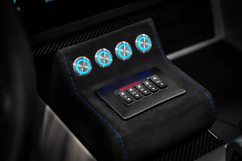 Slide: The Image of Interior control panel of 2026 Nor-Tech 4000 Roadster with illuminated buttons and sleek design. - 9