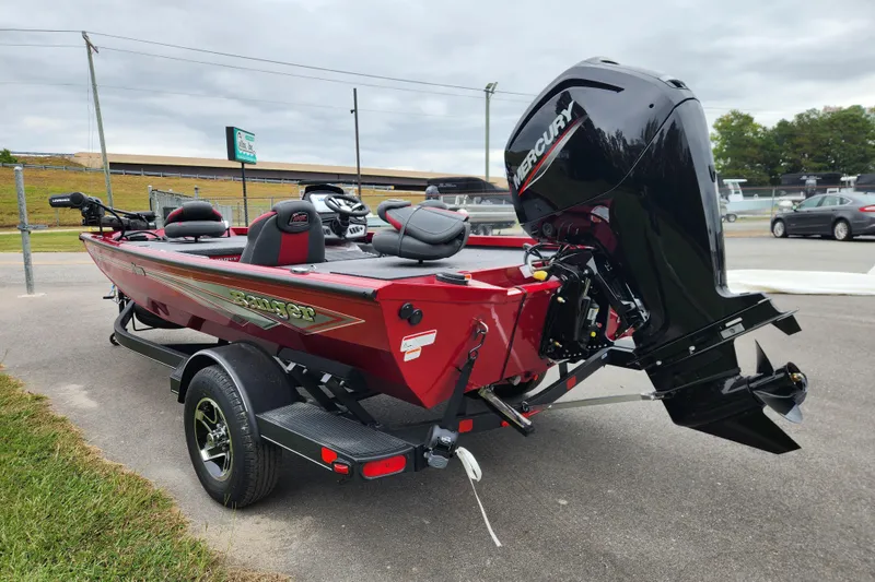 Slide: The Image of 2026 Ranger RT178 boat with Mercury outboard motor, parked on a trailer in a lot. - 3