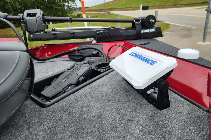 Slide: The Image of 2026 Ranger RT178 boat with Lowrance electronics and Ghost trolling motor on deck. - 8