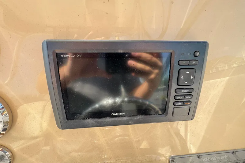 Slide: The Image of Garmin echomap DV on 2012 Wellcraft 210 Coastal boat dashboard. - 10
