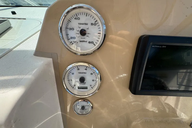 Slide: The Image of Dashboard of 2012 Wellcraft 210 Coastal with Tohatsu gauges and Garmin echomap DV. - 11