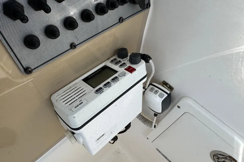 Slide: The Image of VHF radio system on 2012 Wellcraft 210 Coastal boat dashboard. - 15