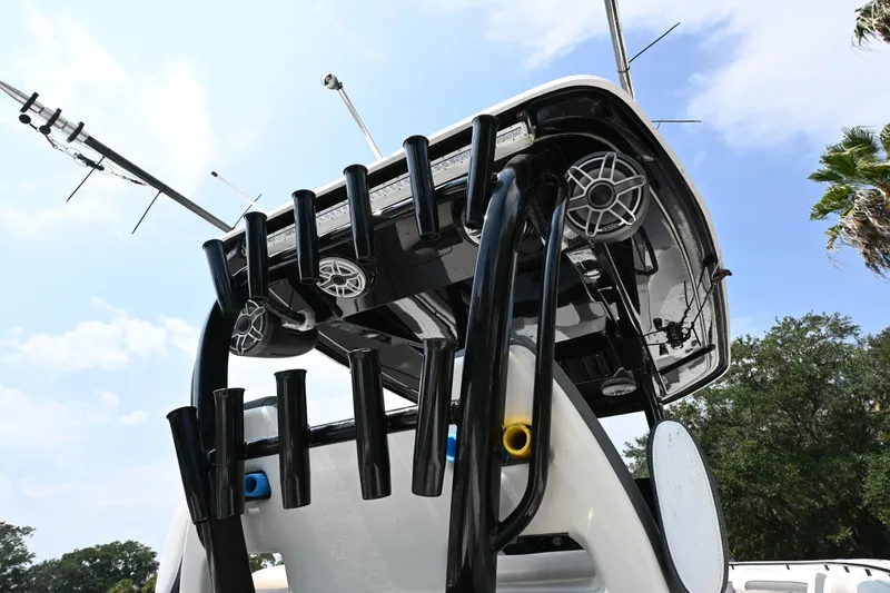 Slide: The Image of 2020 Tidewater 320 CC Adventure boat interior with seating and storage compartments. - 13