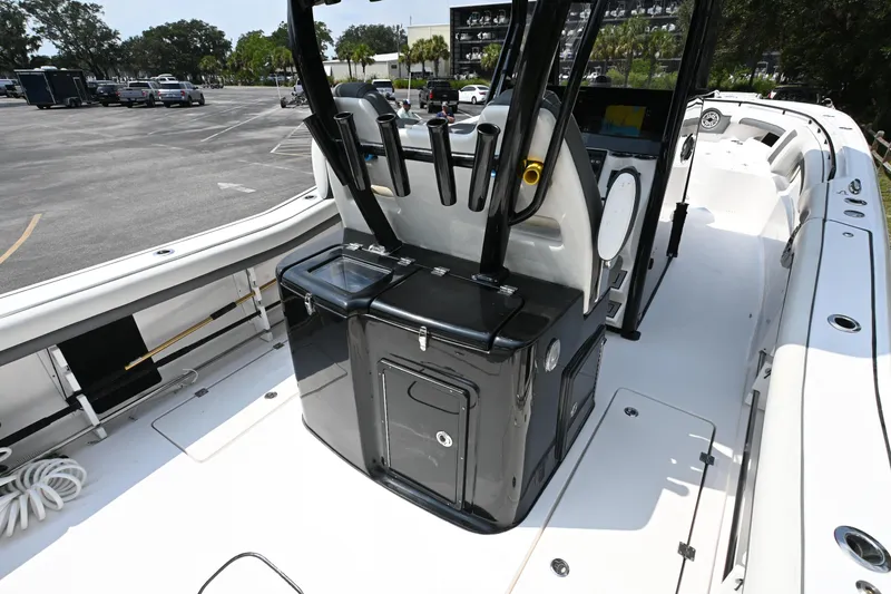 Slide: The Image of 2020 Tidewater 320 CC Adventure boat interior with sleek console and seating. - 18