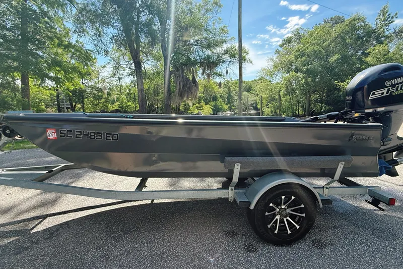 Slide: The Image of Interior of 2025 Reaper Boats 550 with speakers and control panel. - 7