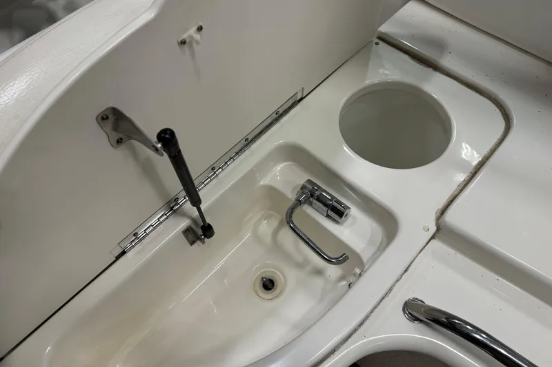 Slide: The Image of 2006 Sea Ray 290 Select EX boat sink and faucet detail. - 15