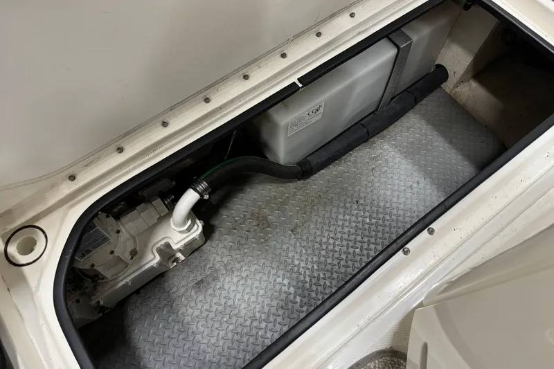 Slide: The Image of Engine compartment of 2006 Sea Ray 290 Select EX boat, showing mechanical components. - 20