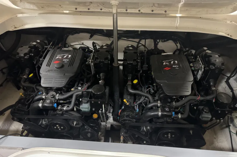 Slide: The Image of Twin MerCruiser engines in a 2006 Sea Ray 290 Select EX boat. - 27