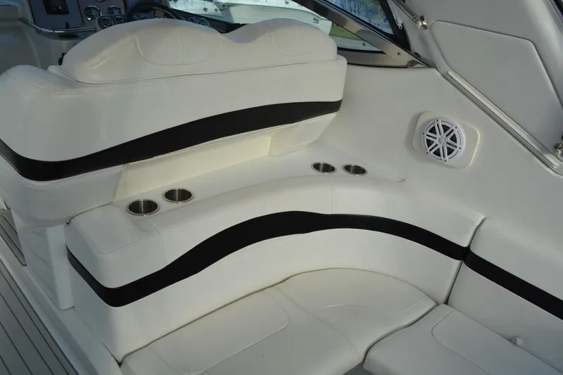 Slide: The Image of 2006 Formula 34 Performance Cruiser interior with white seating and cup holders. - 11