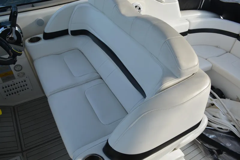 Slide: The Image of 2006 Formula 34 Performance Cruiser interior with white leather seating and steering wheel. - 13