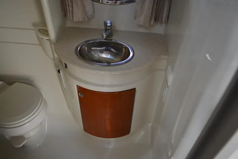 Slide: The Image of 2006 Formula 34 Performance Cruiser bathroom with sink and toilet. - 24