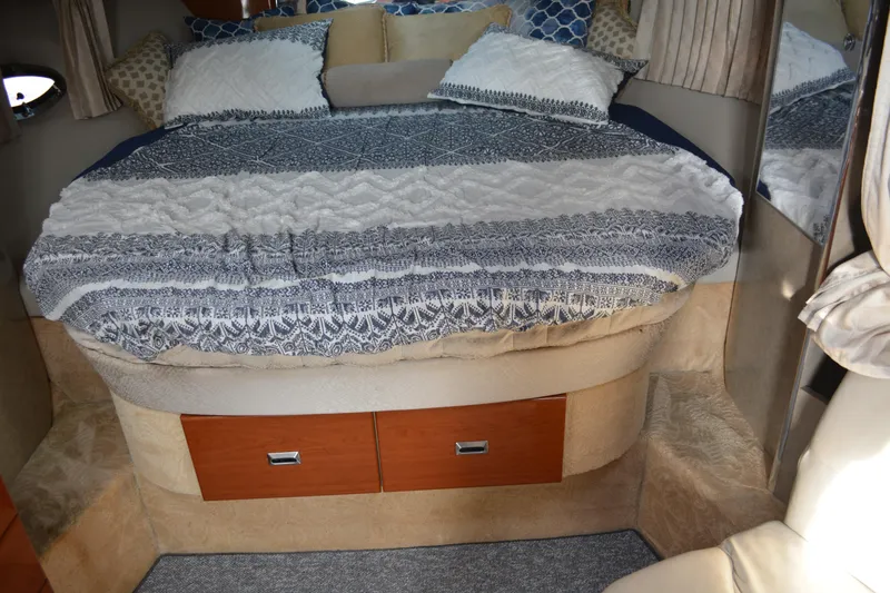 Slide: The Image of Interior cabin of 2006 Formula 34 Performance Cruiser with cozy bed and storage drawers. - 27