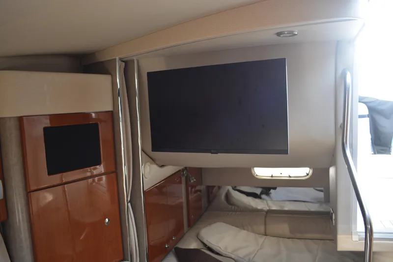 Slide: The Image of Interior of 2006 Formula 34 Performance Cruiser with TV and wooden cabinetry. - 28