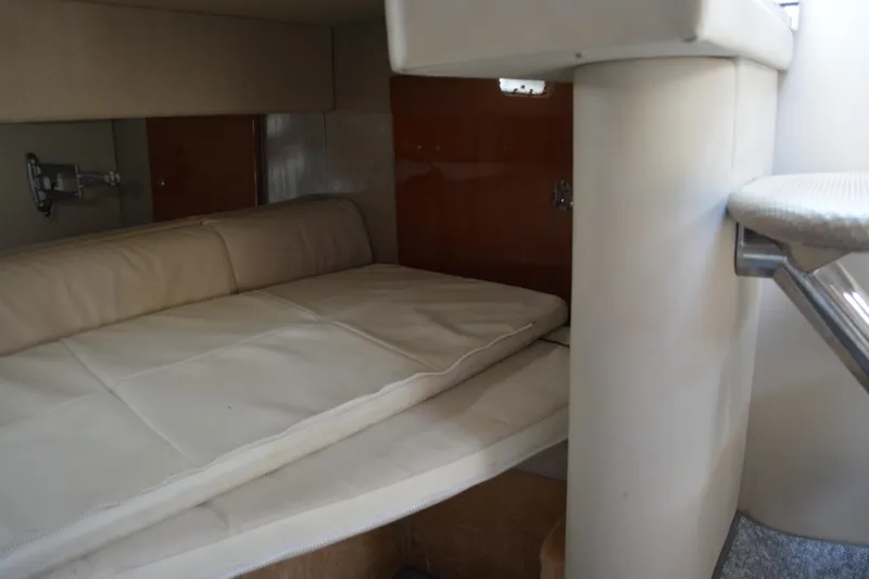 Slide: The Image of 2006 Formula 34 Performance Cruiser interior cabin with beige seating and compact design. - 29