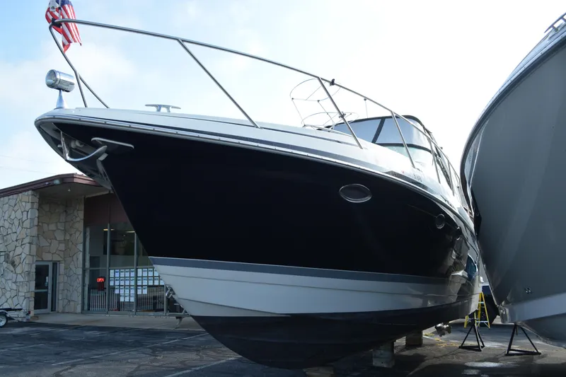 Slide: The Image of 2006 Formula 34 Performance Cruiser boat displayed outdoors, side view. - 4