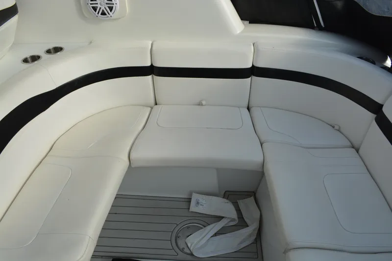 Slide: The Image of 2006 Formula 34 Performance Cruiser interior seating with white upholstery and black accents. - 9