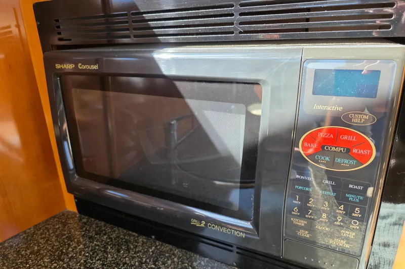 Slide: The Image of Sharp Carousel microwave in 2005 Carver 41 Cockpit Motor Yacht kitchen. - 32