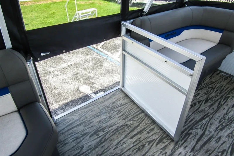 Slide: The Image of Interior of 2025 Armada v17 boat with modern seating and open door. - 10