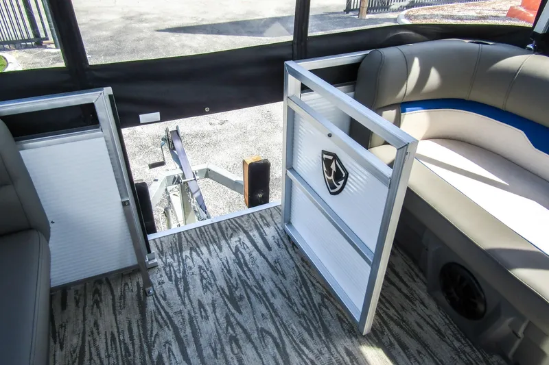Slide: The Image of Interior view of 2025 Armada v17 boat with open gate and seating. - 14