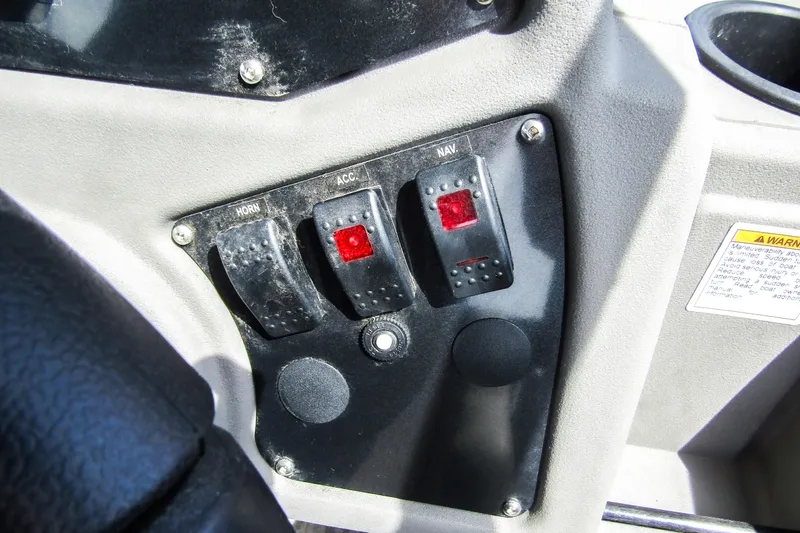 Slide: The Image of Control panel of 2025 Armada v17 with horn, accessory, and navigation switches. - 21
