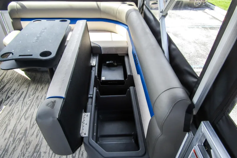 Slide: The Image of 2025 Armada v17 interior with open storage compartments and seating. - 23