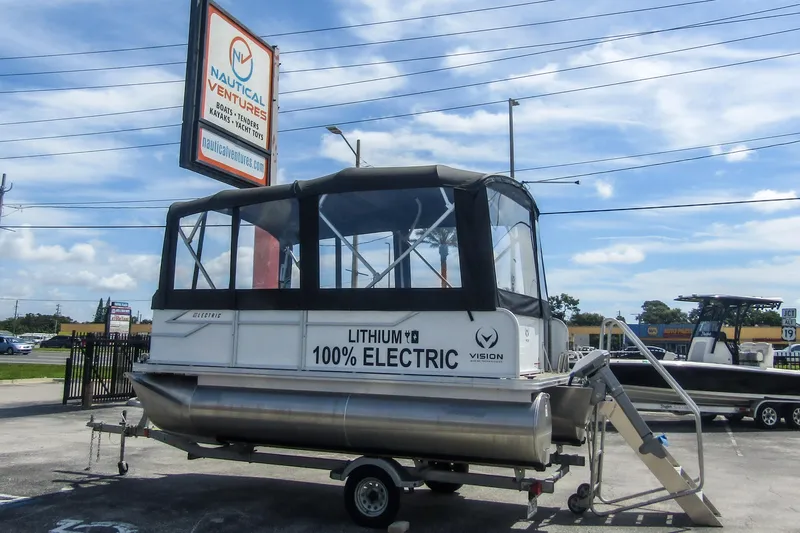 Slide: The Image of 2025 Armada v17 electric boat at Nautical Ventures dealership, featuring lithium battery technology. - 5