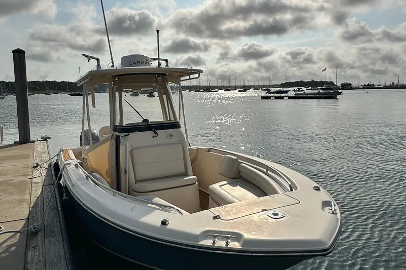 Slide: The Image of 2019 Grady-White Fisherman 257 boat docked in a sunny marina setting. - 3