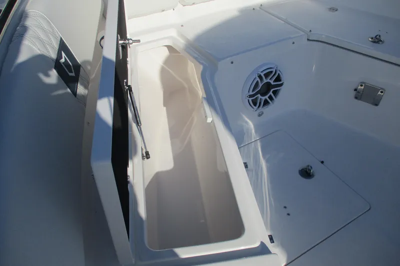Slide: The Image of 2026 Sea Fox 328 Commander boat storage compartment with speaker detail. - 15